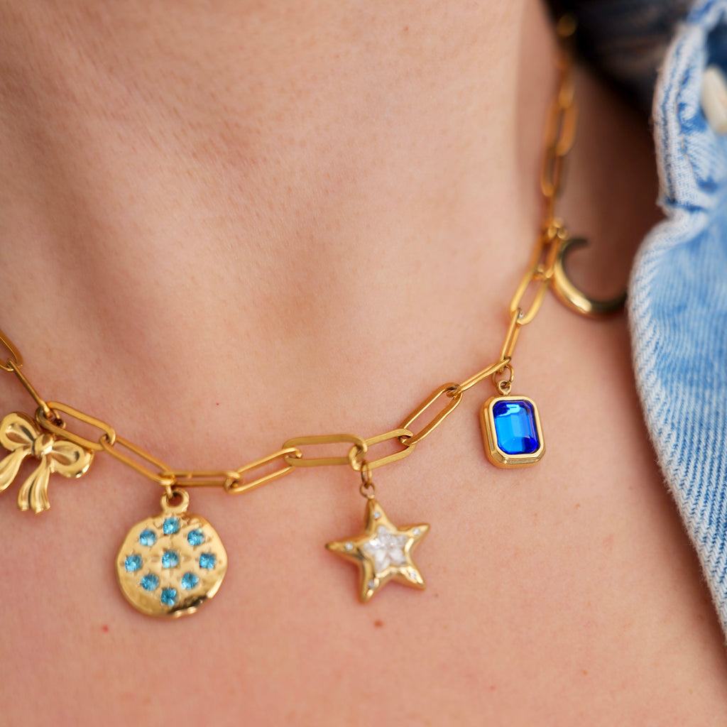 Lucy in the sky blue charm necklace