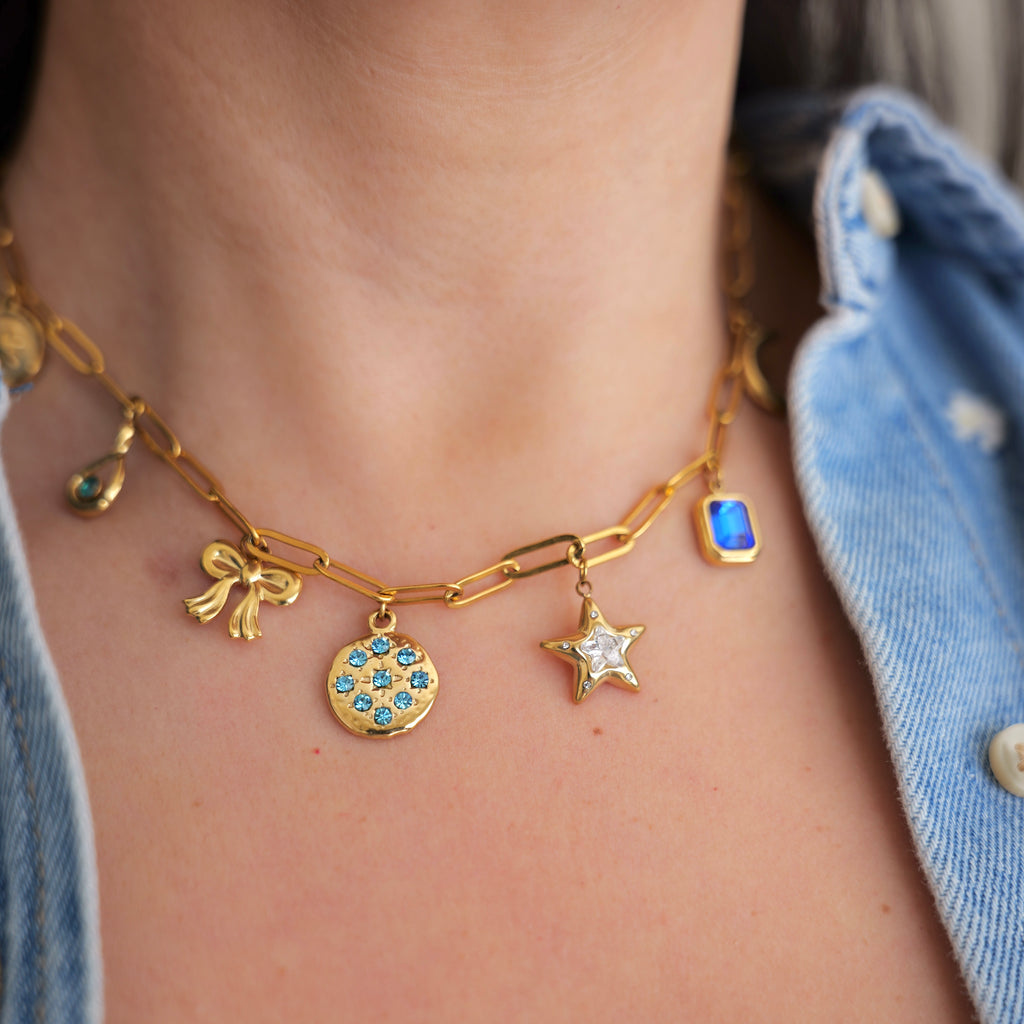 Lucy in the sky blue charm necklace
