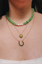 Green beaded necklace with freshwater pearls
