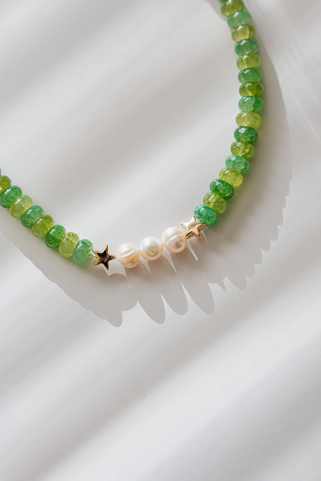 Green beaded necklace with freshwater pearls