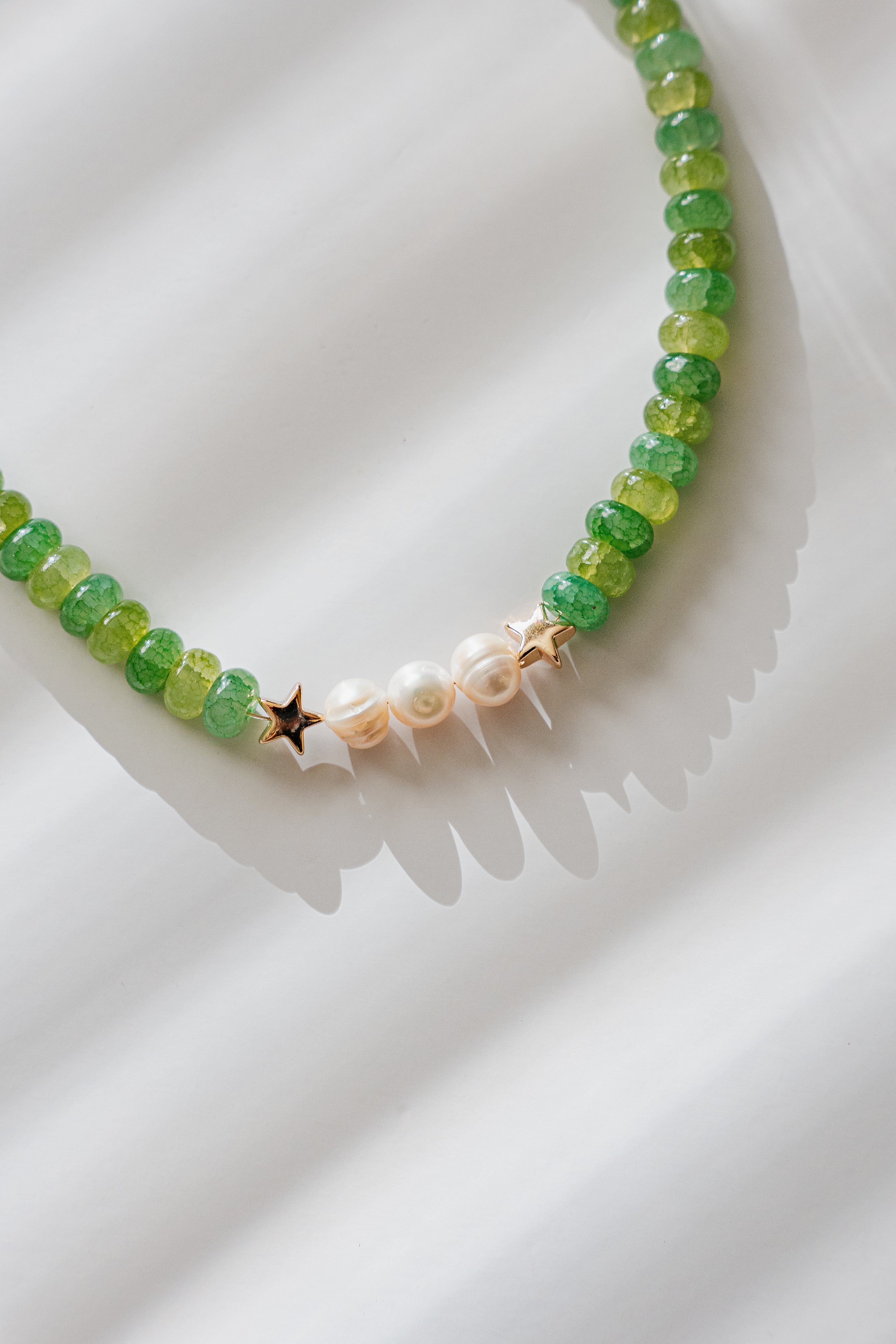 Green beaded necklace with freshwater pearls