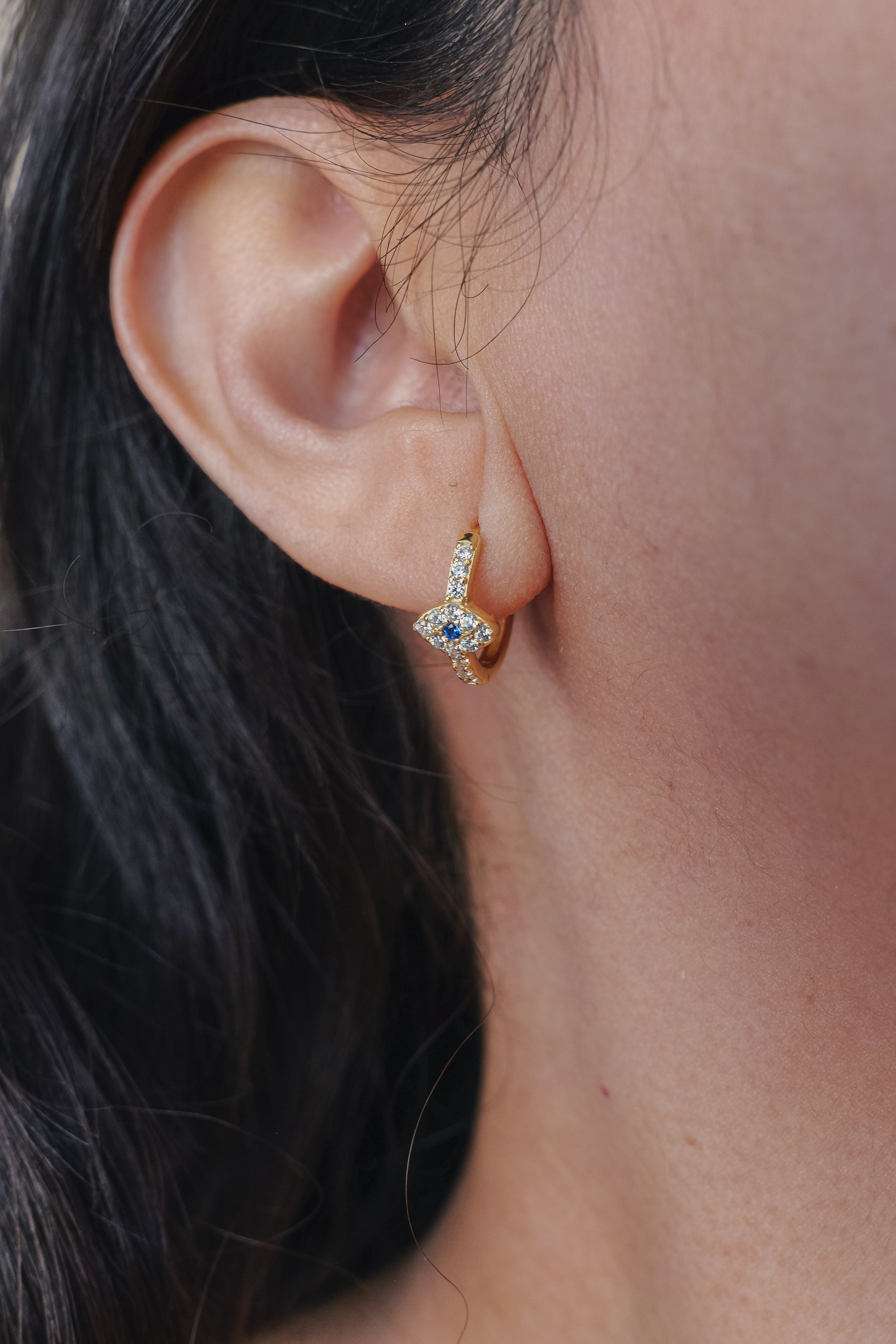 Lucky Blue Minis – Sterling Silver Gold Evil Eye Huggie Earrings