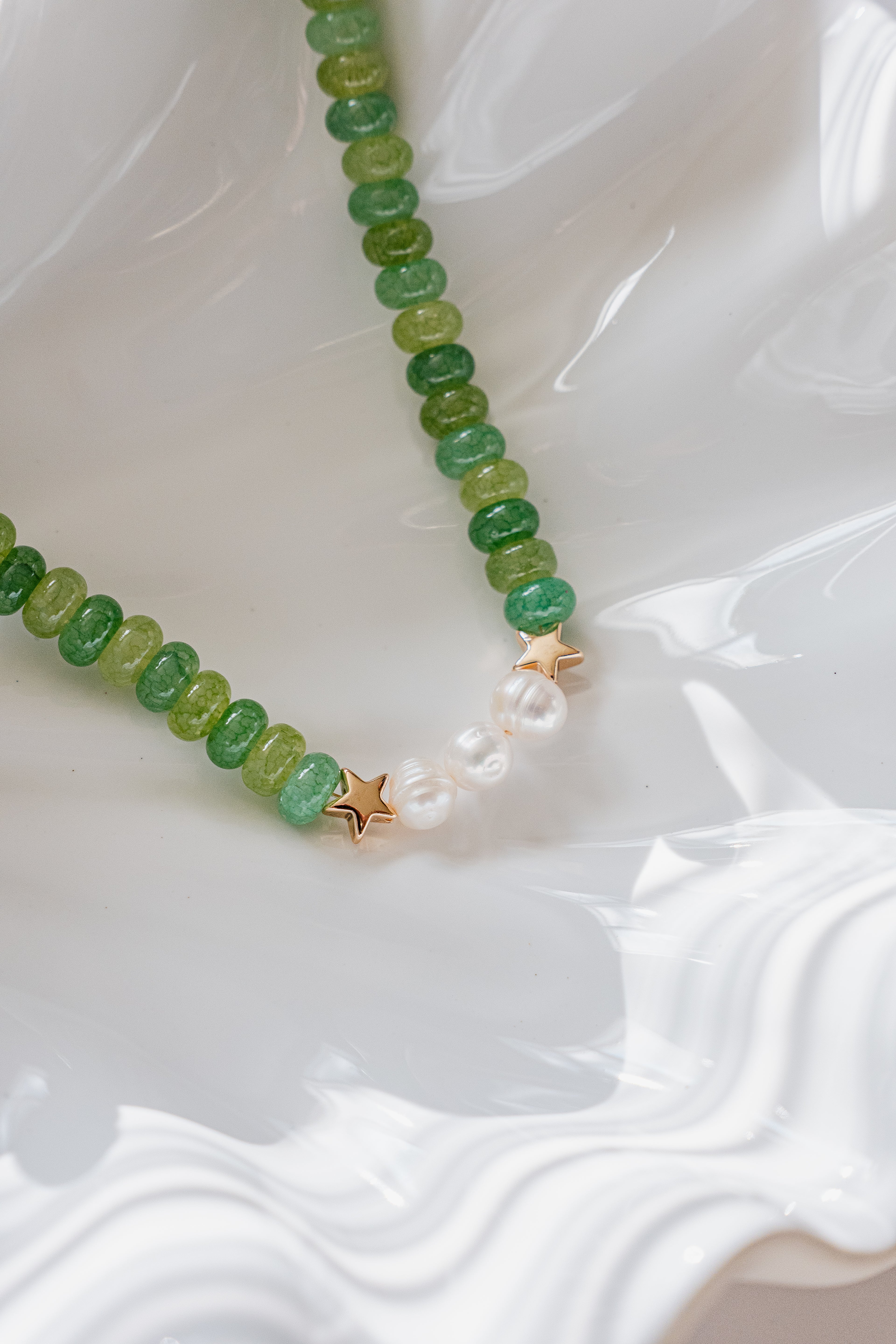 Green beaded necklace with freshwater pearls