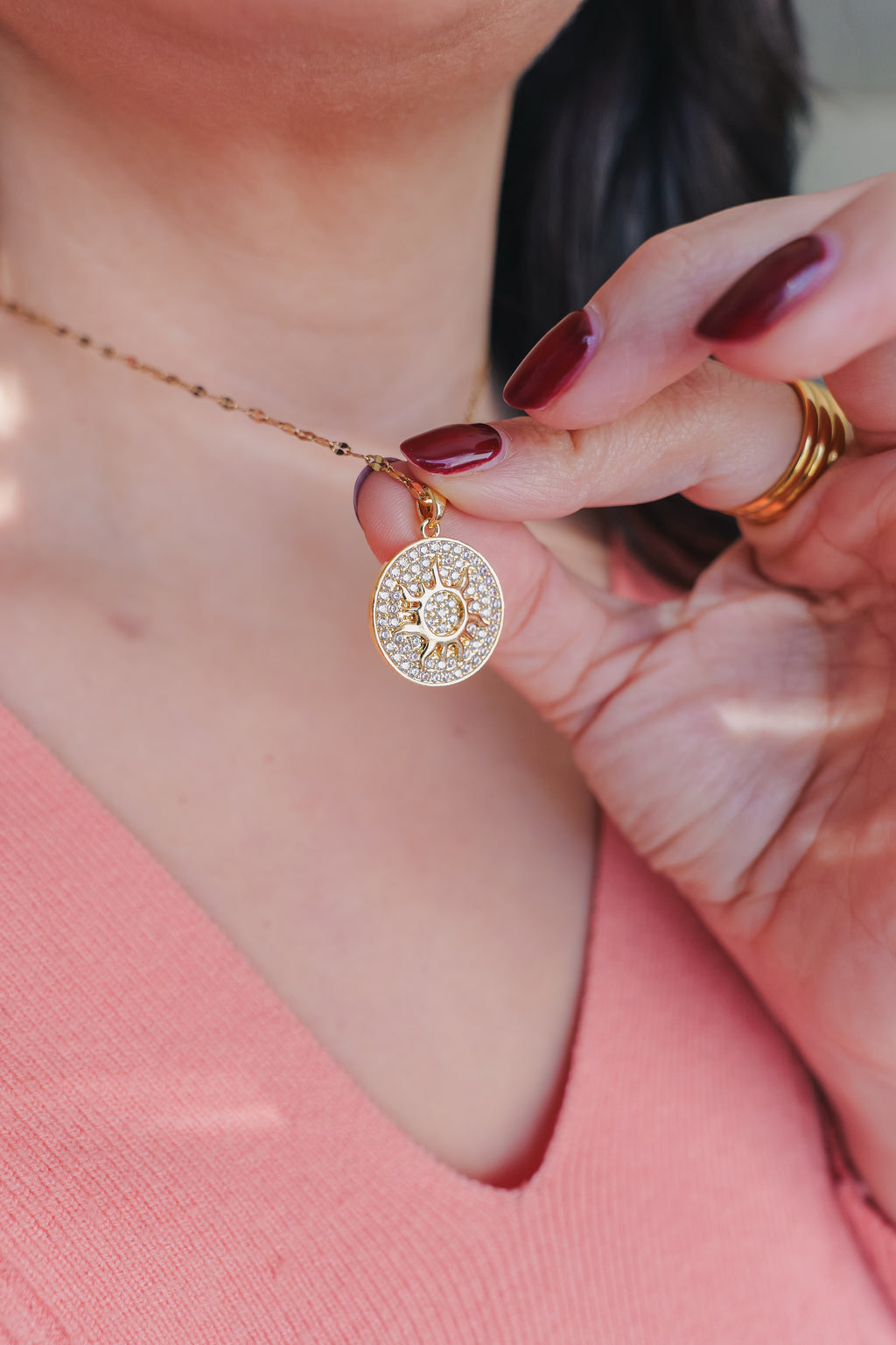 Inner Sparkle Necklace – Gold Sunburst Pendant with CZ Crystals (16” + Extender)