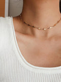 gold tiny cross necklace