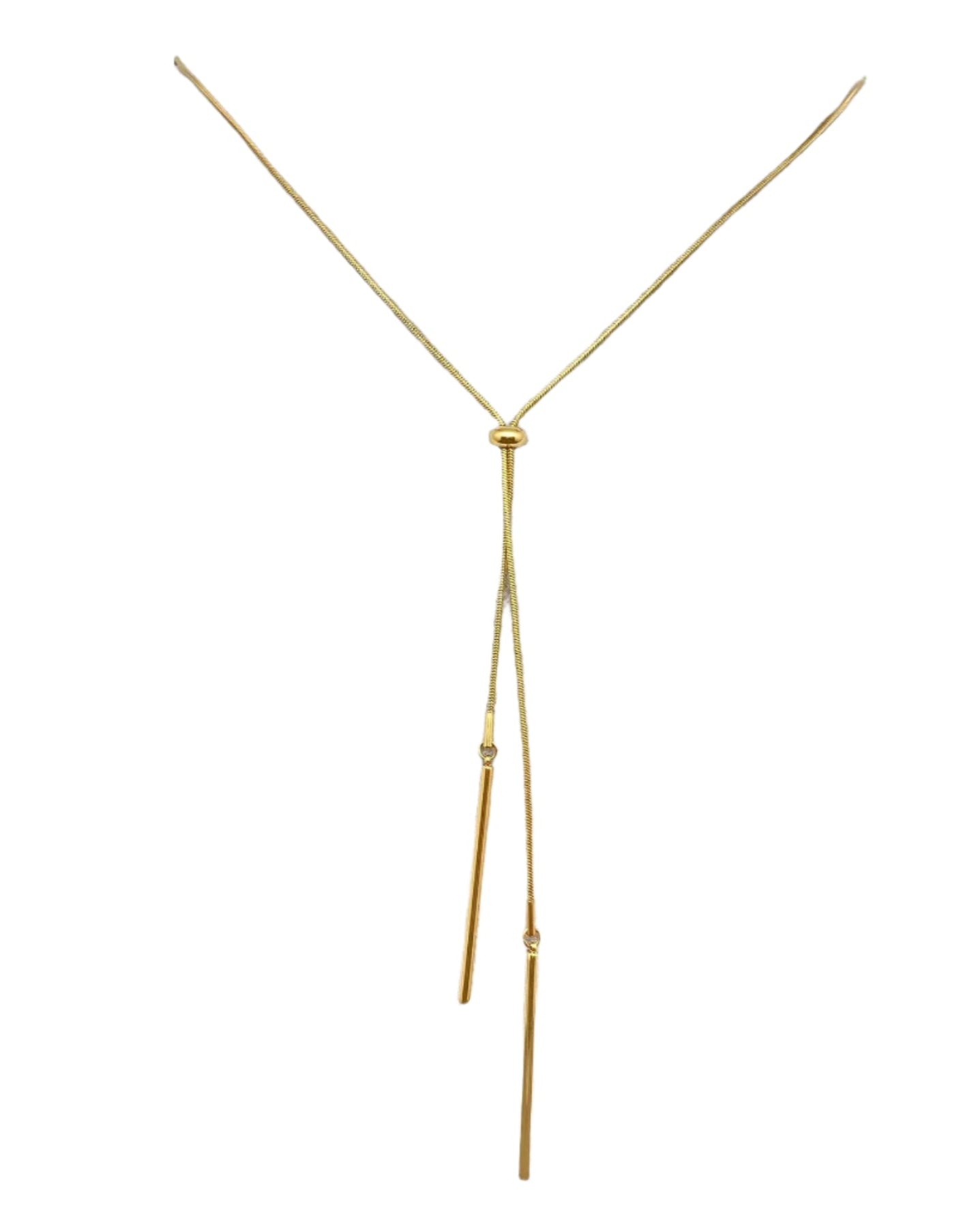 Gold necklace on a mannequin bust against a gray background